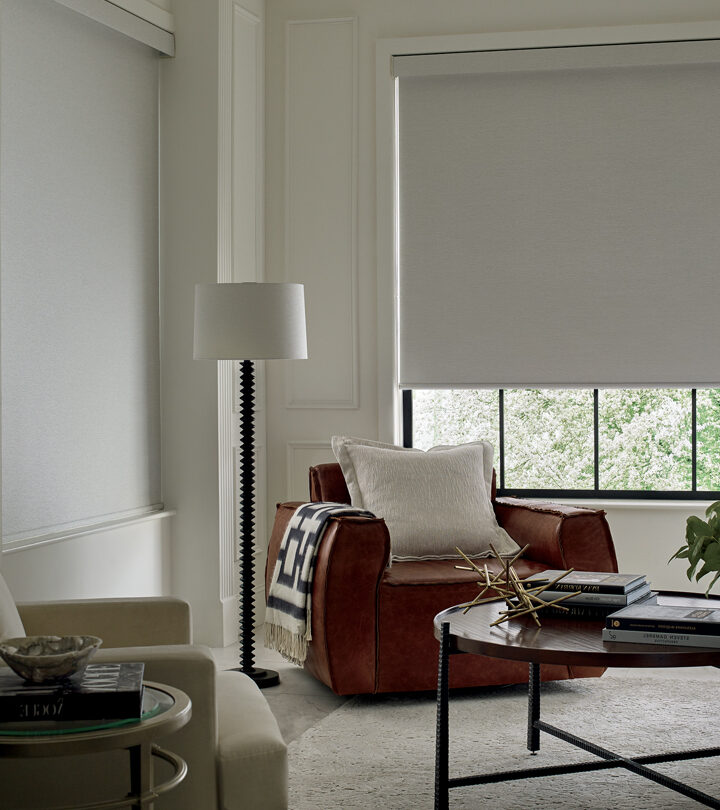 beige corner nook with brown accent chair next to window