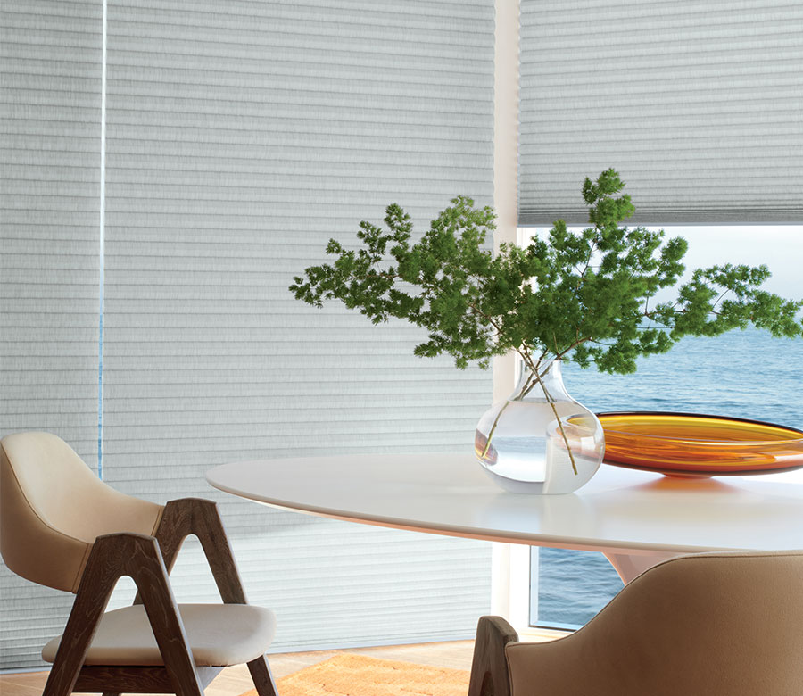 gray duette honeycomb shades in dining area in Little Canada MN