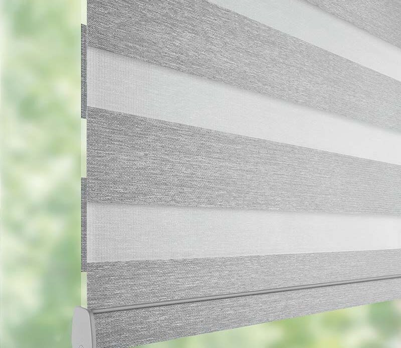 close up detail of gray window shade for room darkening in Burnsville, MN