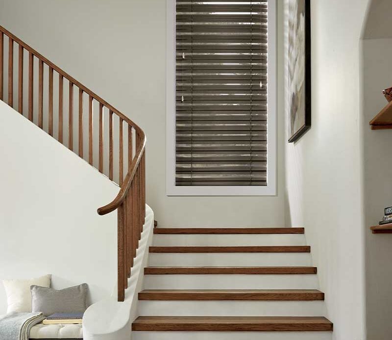 entryway staircase with dark brown metal blinds in Minneapolis, MN