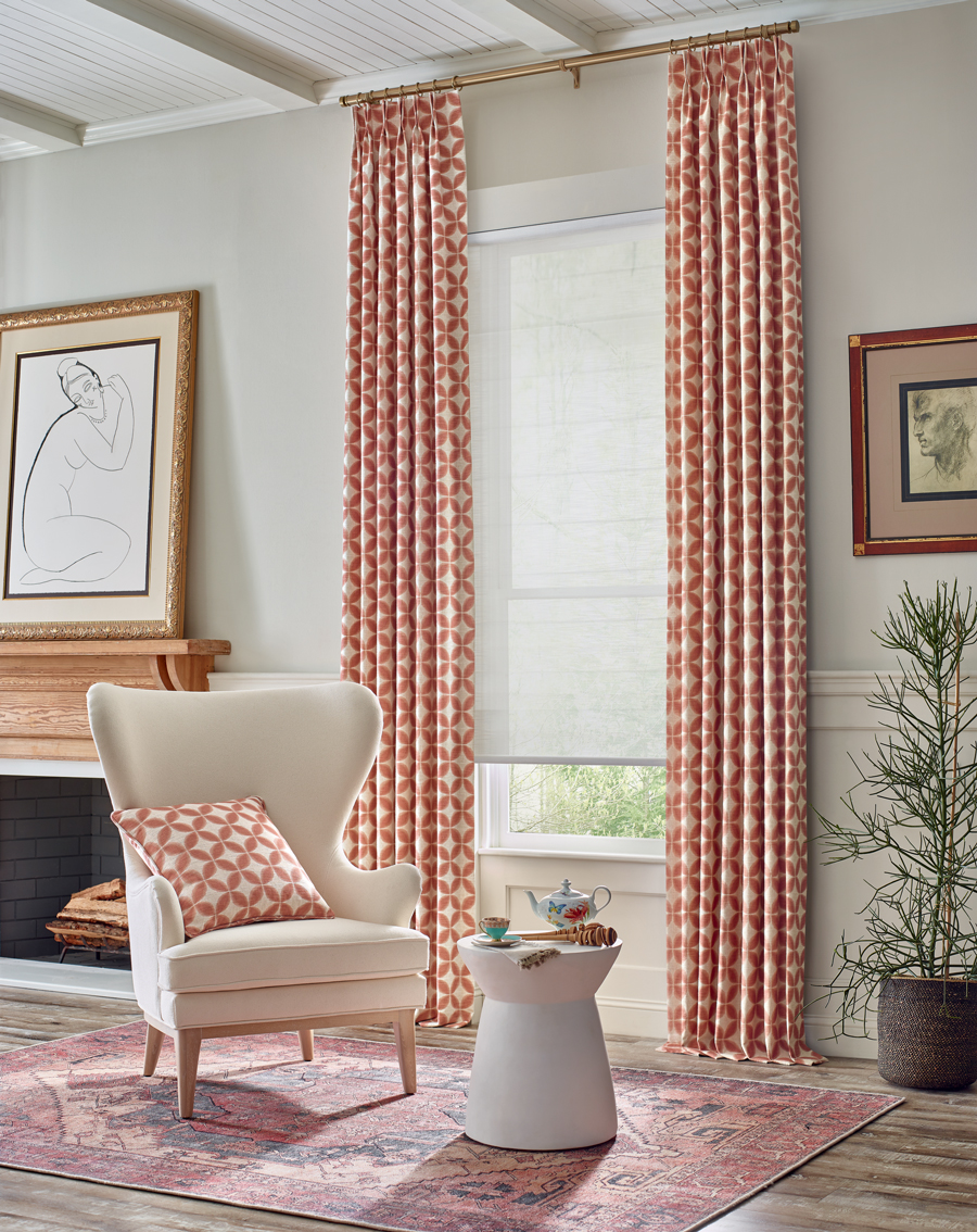 living room in Burnsville MN with high ceilings and tall windows with red patterned drapery